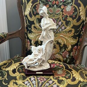 Giuseppe, Armani, mother & baby statue